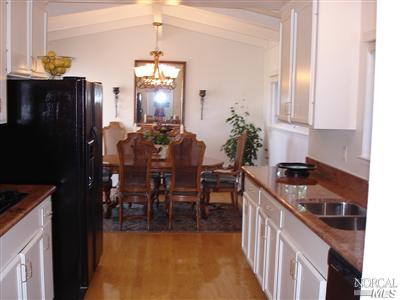 80 Half Moon Road Novato, CA 94947 - Photo 6 of 12 a kitchen with granite countertop furniture a counter space and stainless steel appliances