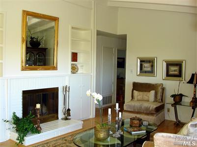 80 Half Moon Road Novato, CA 94947 - Photo 8 of 12 a living room with furniture and a fireplace