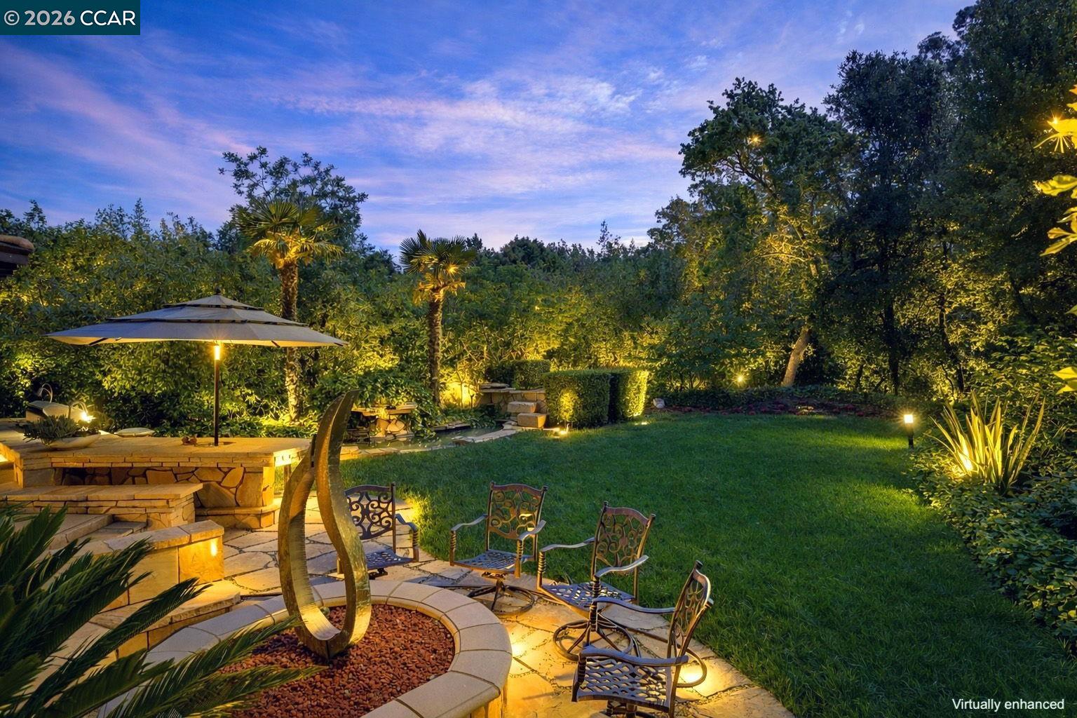 490 St Marys Road Lafayette, CA 94549 - Photo 38 of 61 a view of a yard with table and chairs and potted plants