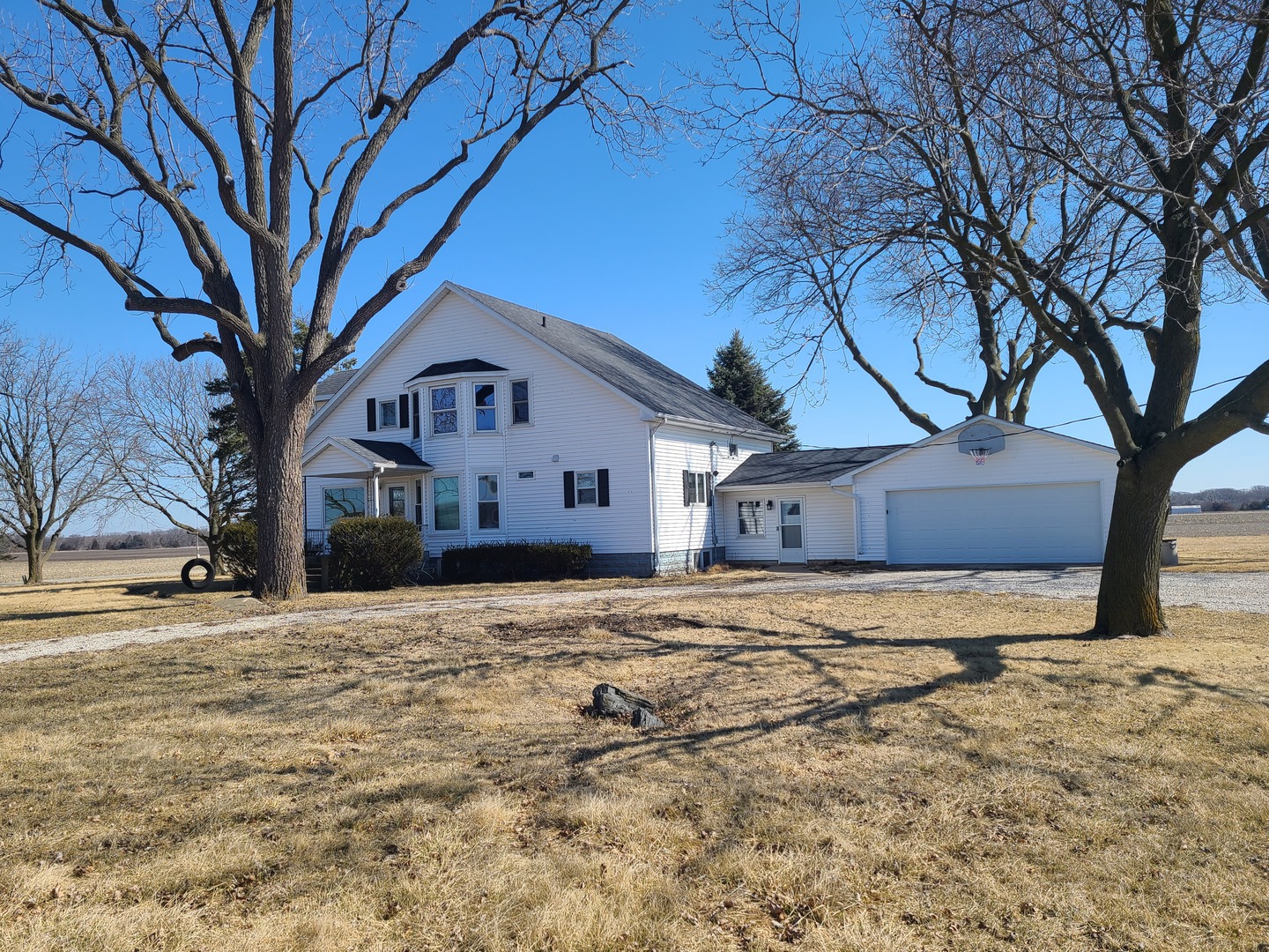 1460 North 2401st Road Ottawa, IL 61350 - Photo 1 of 32 a house that has a tree in front of it