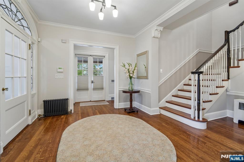 29 Hillcrest Road Glen Ridge, NJ 07028 - Photo 15 of 44 a bedroom with furniture and a wooden floor