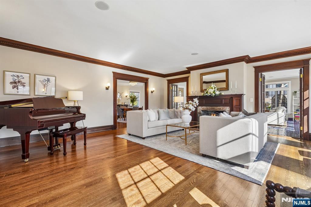 29 Hillcrest Road Glen Ridge, NJ 07028 - Photo 17 of 44 a living room with furniture and a table