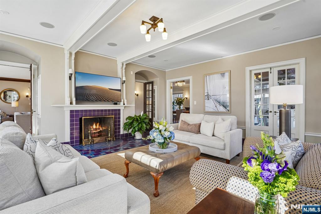 29 Hillcrest Road Glen Ridge, NJ 07028 - Photo 19 of 44 a living room with furniture and a fireplace