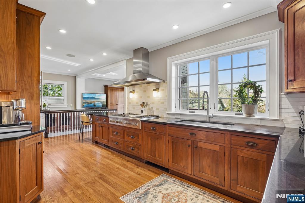 29 Hillcrest Road Glen Ridge, NJ 07028 - Photo 22 of 44 a large kitchen with lots of counter space and wooden floor