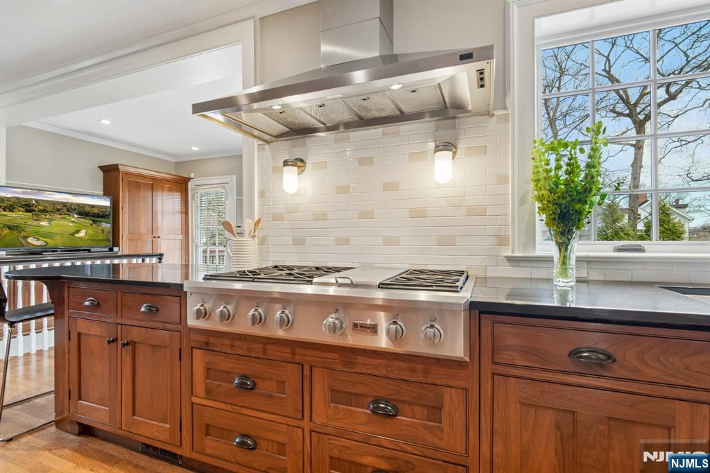 29 Hillcrest Road Glen Ridge, NJ 07028 - Photo 23 of 44 a kitchen with stainless steel appliances granite countertop a stove and a sink