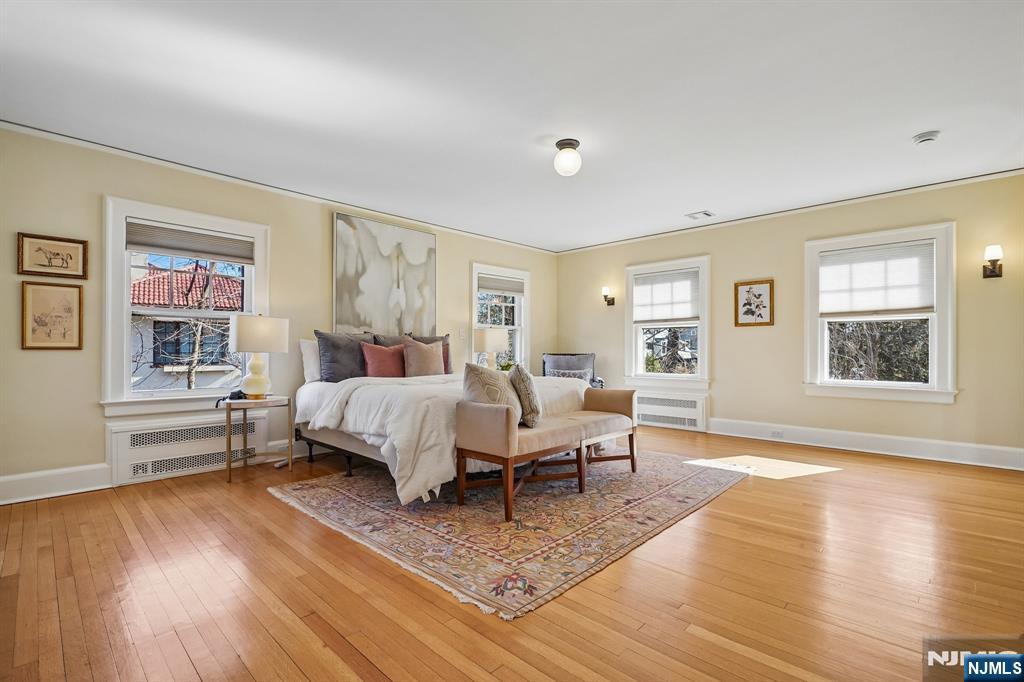 29 Hillcrest Road Glen Ridge, NJ 07028 - Photo 28 of 44 a living room with furniture and a wooden floor