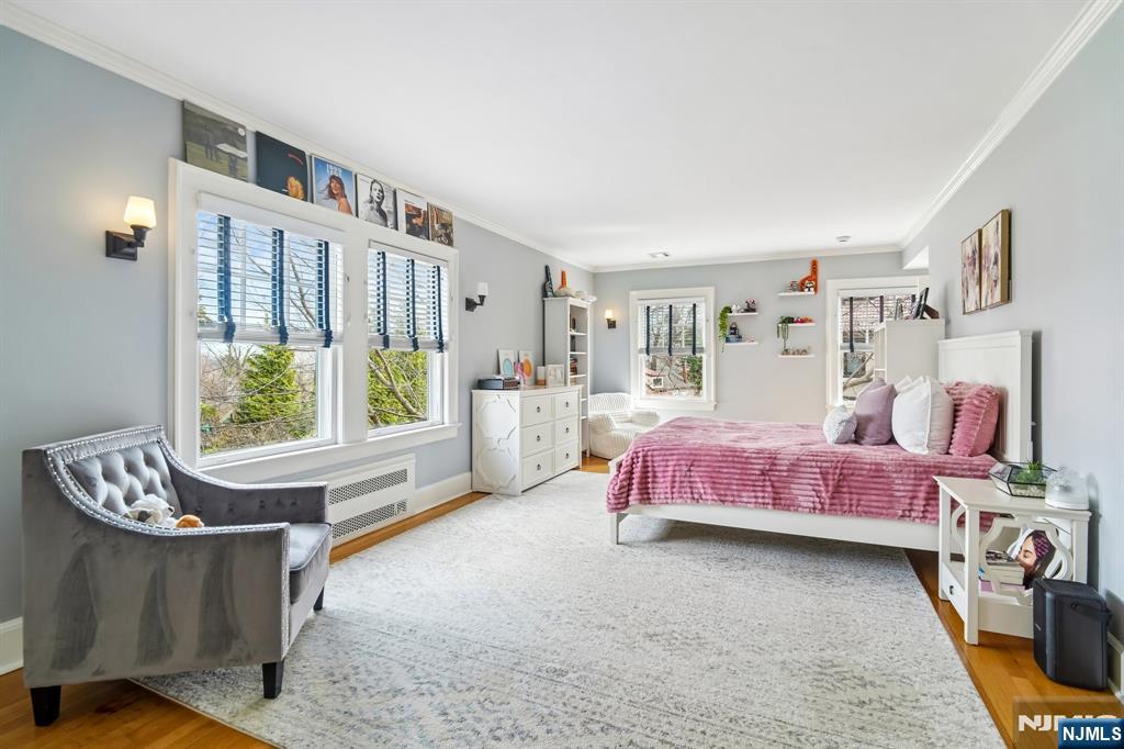 29 Hillcrest Road Glen Ridge, NJ 07028 - Photo 30 of 44 a bed room with a bed and a window