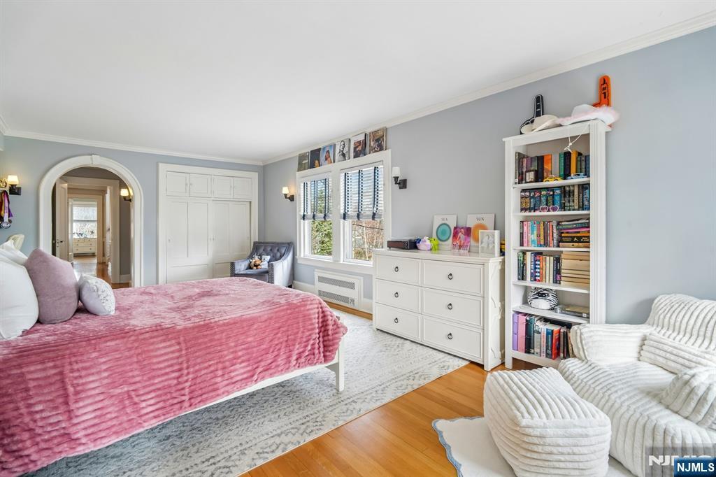 29 Hillcrest Road Glen Ridge, NJ 07028 - Photo 31 of 44 a bedroom with a bed and a large window