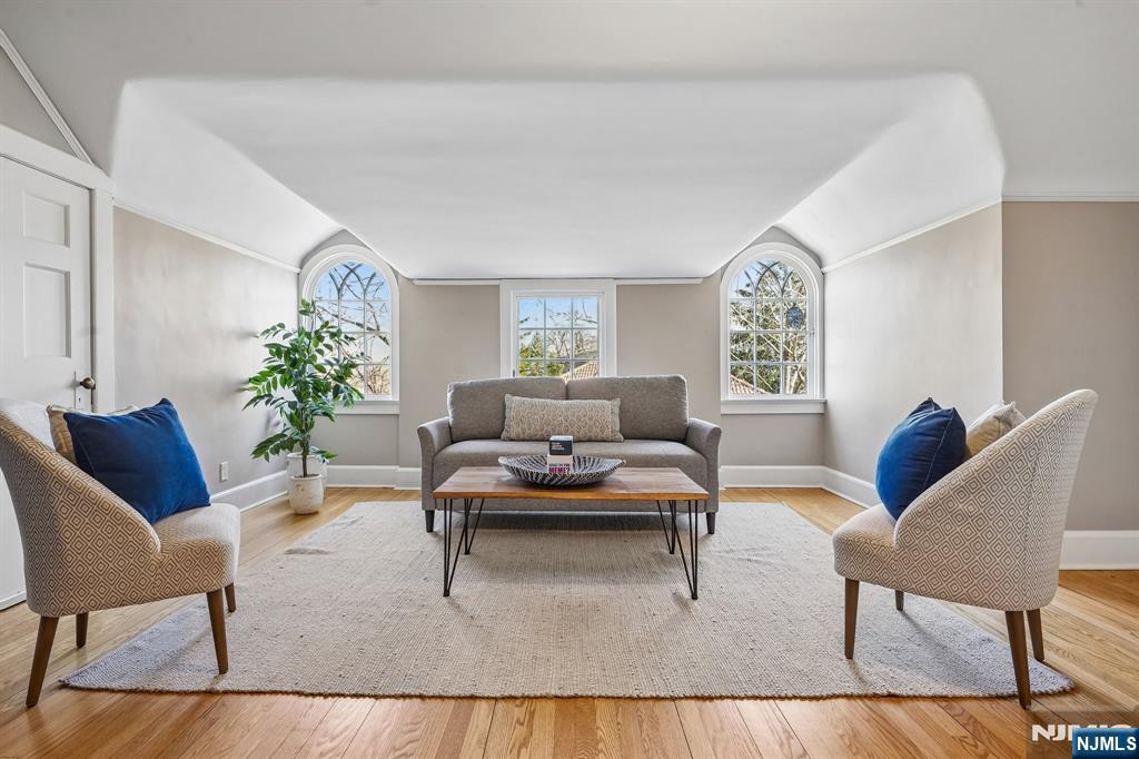29 Hillcrest Road Glen Ridge, NJ 07028 - Photo 39 of 44 a living room with furniture and a potted plant on table