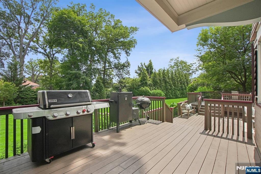 29 Hillcrest Road Glen Ridge, NJ 07028 - Photo 8 of 44 a view of a deck with wooden floor and outer view