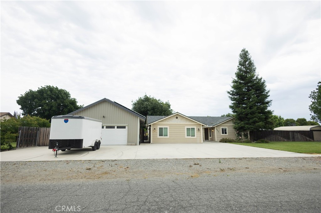 6042 Grange Road Corning, CA 96021 - Photo 1 of 38 a view of a house with a yard