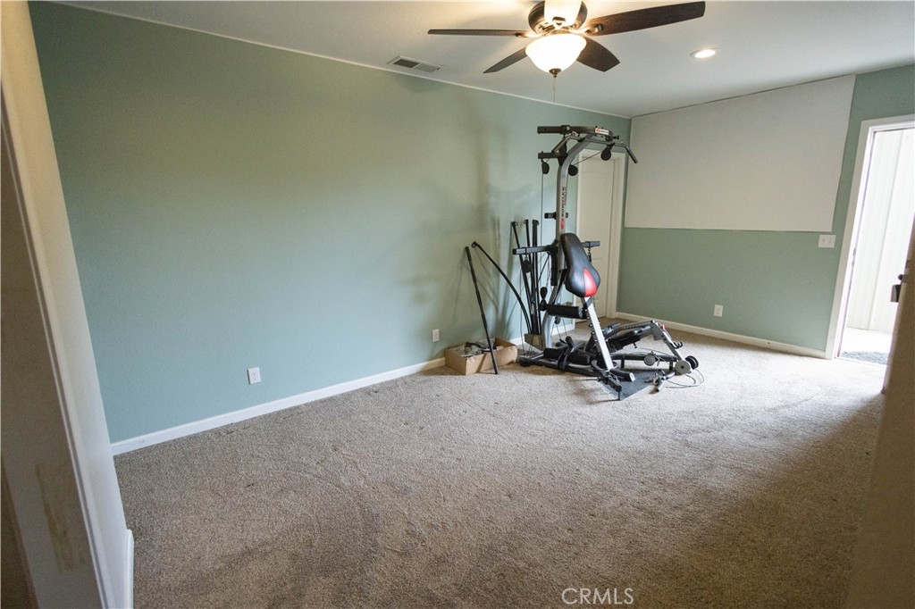 6042 Grange Road Corning, CA 96021 - Photo 15 of 38 a view of a room with gym equipment