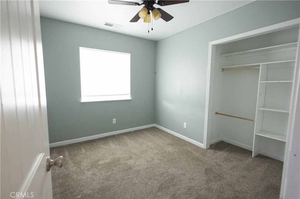 6042 Grange Road Corning, CA 96021 - Photo 7 of 38 a view of an empty room with a window