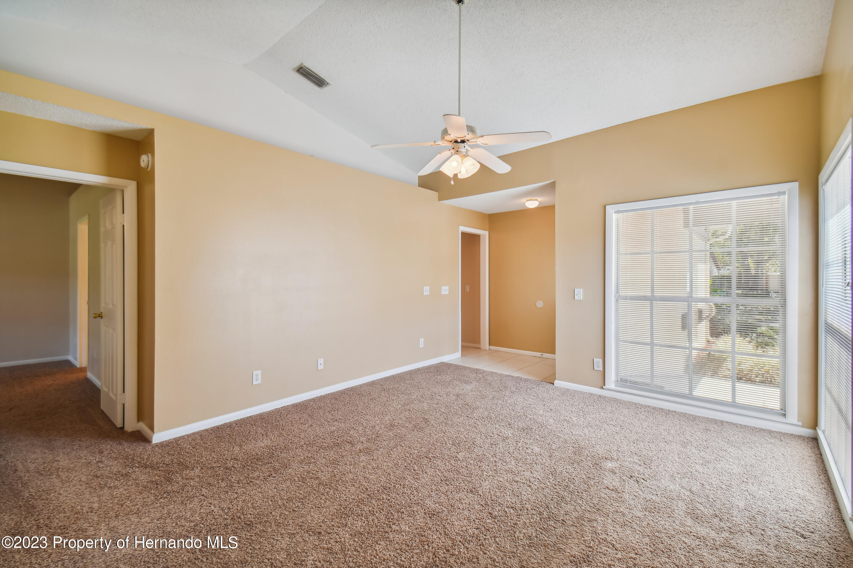 1735 Elk Spring Drive Brandon, FL 33511 - Photo 16 of 49 a view of an empty room with a window