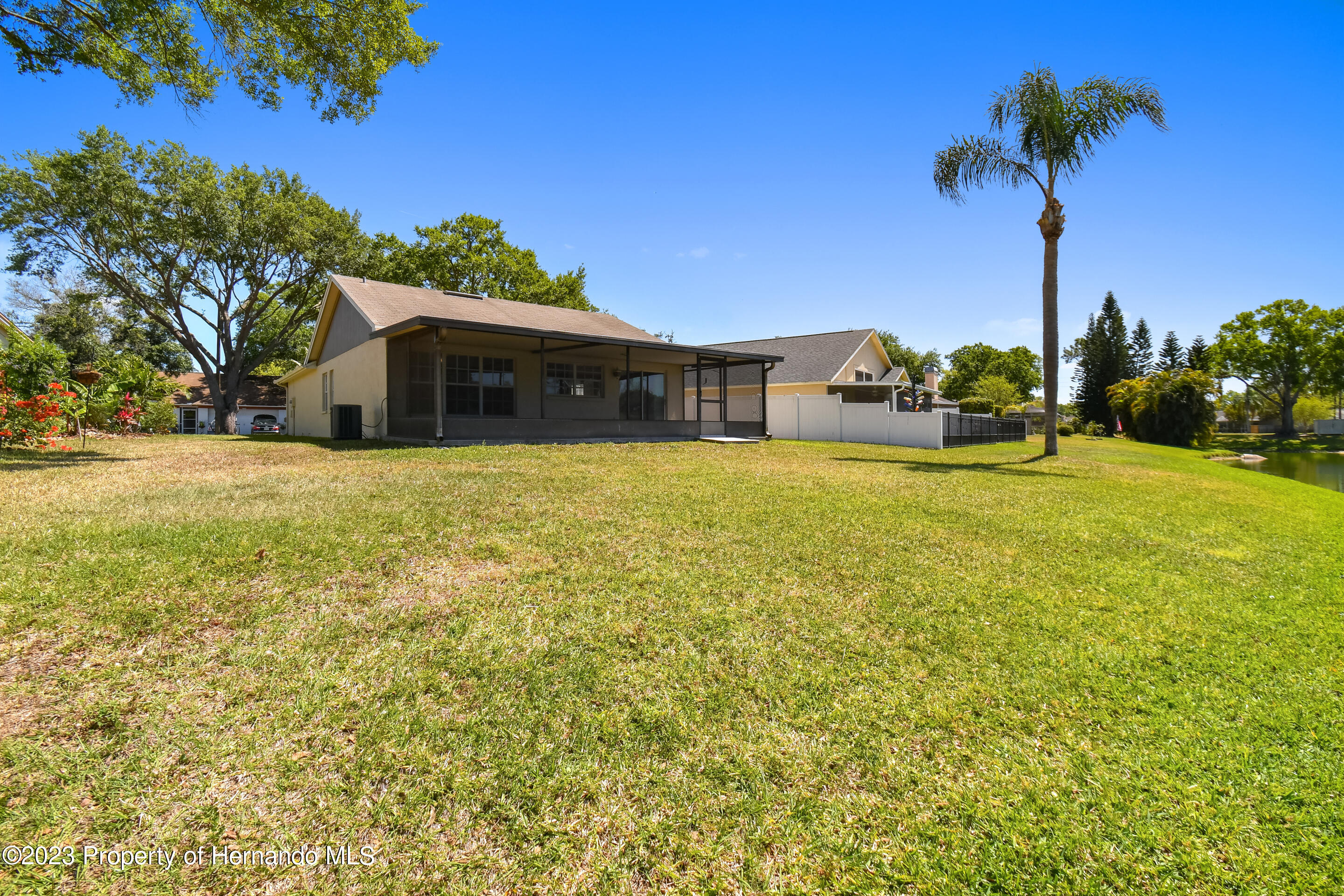 1735 Elk Spring Drive Brandon, FL 33511 - Photo 31 of 49 a view of a patio with a table and chairs