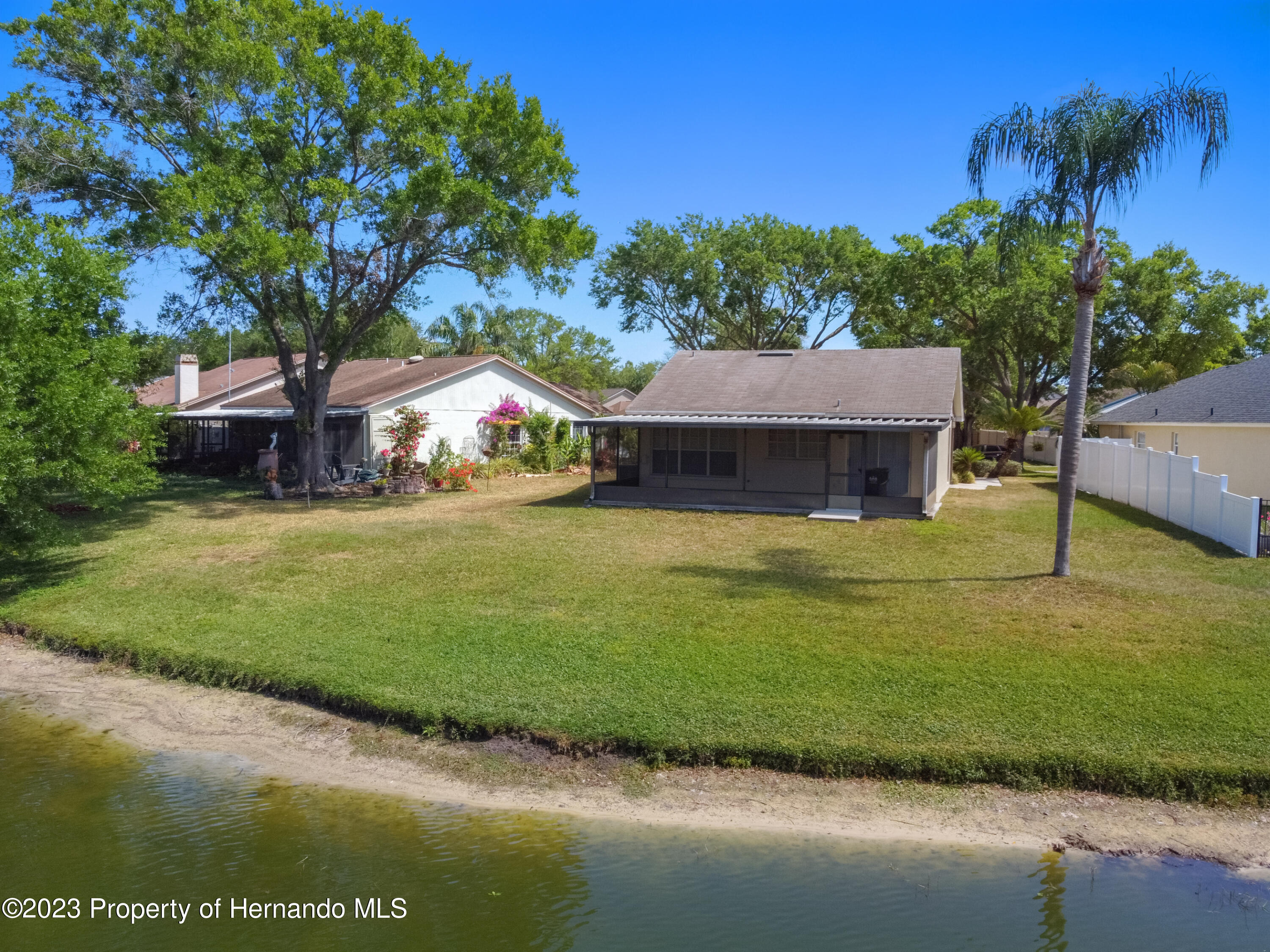 1735 Elk Spring Drive Brandon, FL 33511 - Photo 39 of 49 a view of a house with a swimming pool