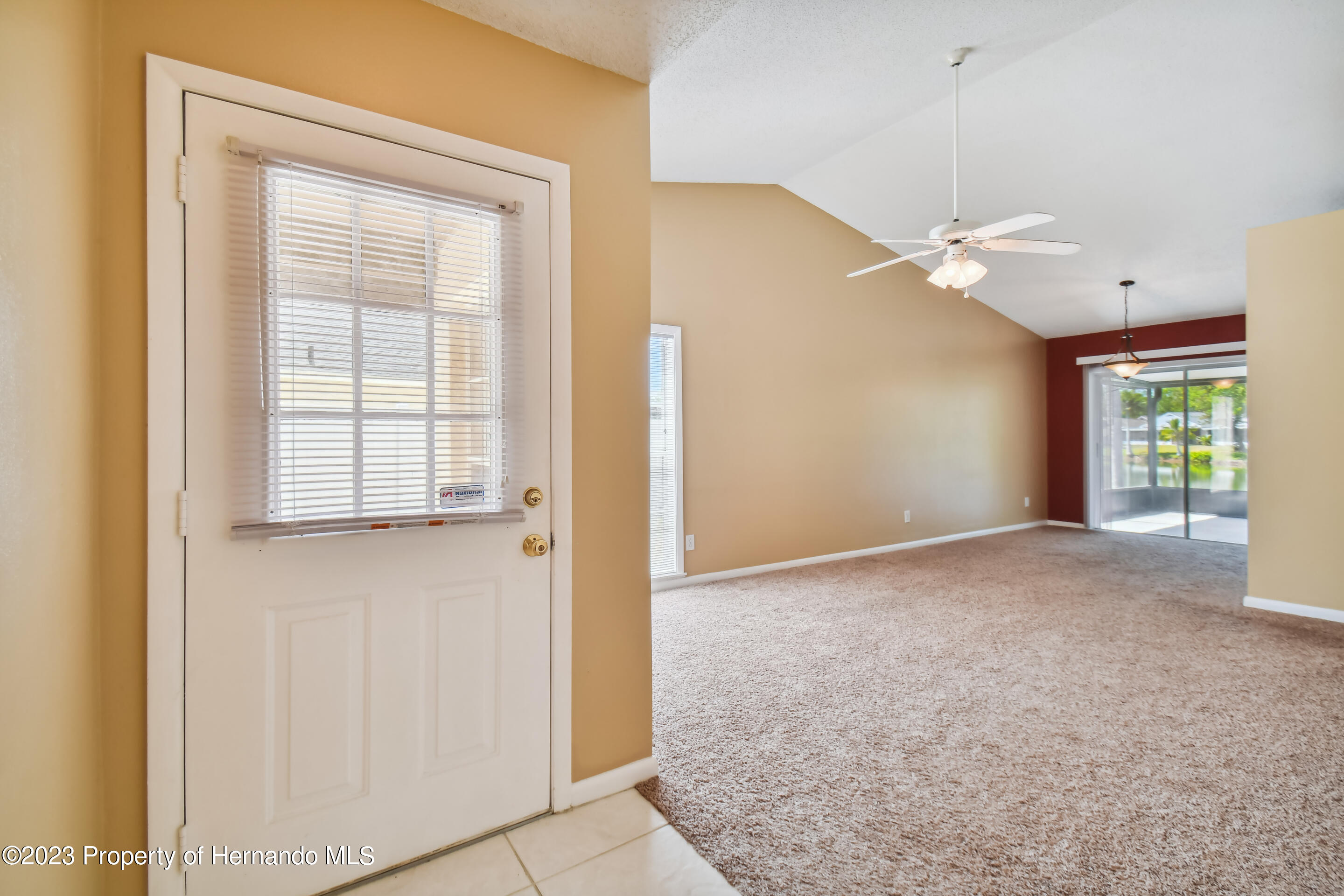 1735 Elk Spring Drive Brandon, FL 33511 - Photo 10 of 49 a view of an empty room with a window