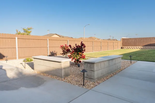 a view of a terrace with a yard