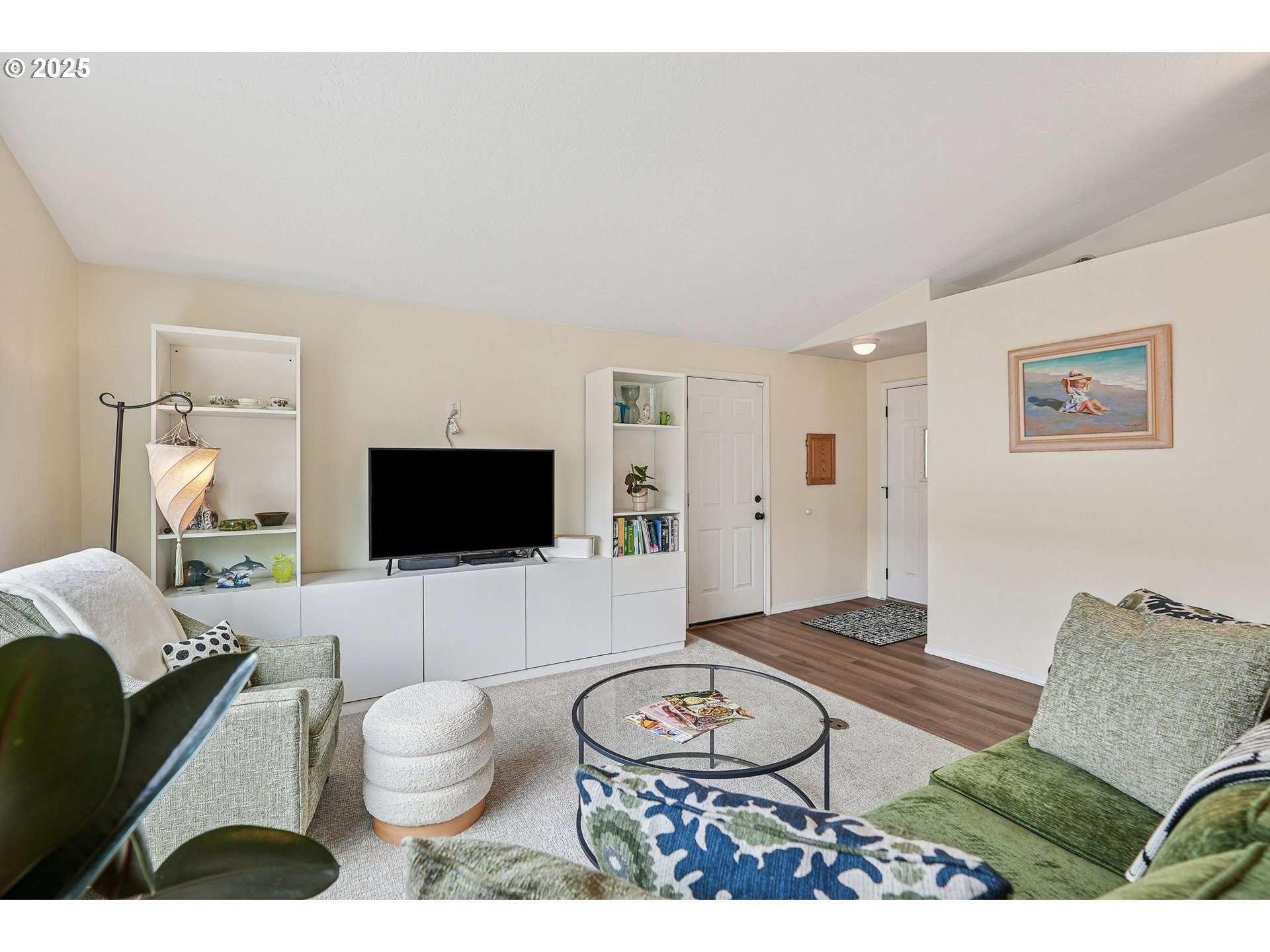 591 Southwest Filbert Street McMinnville, OR 97128 - Photo 6 of 34 a living room with furniture and a flat screen tv