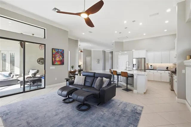 a bathroom with a sink vanity granite toilet and shower