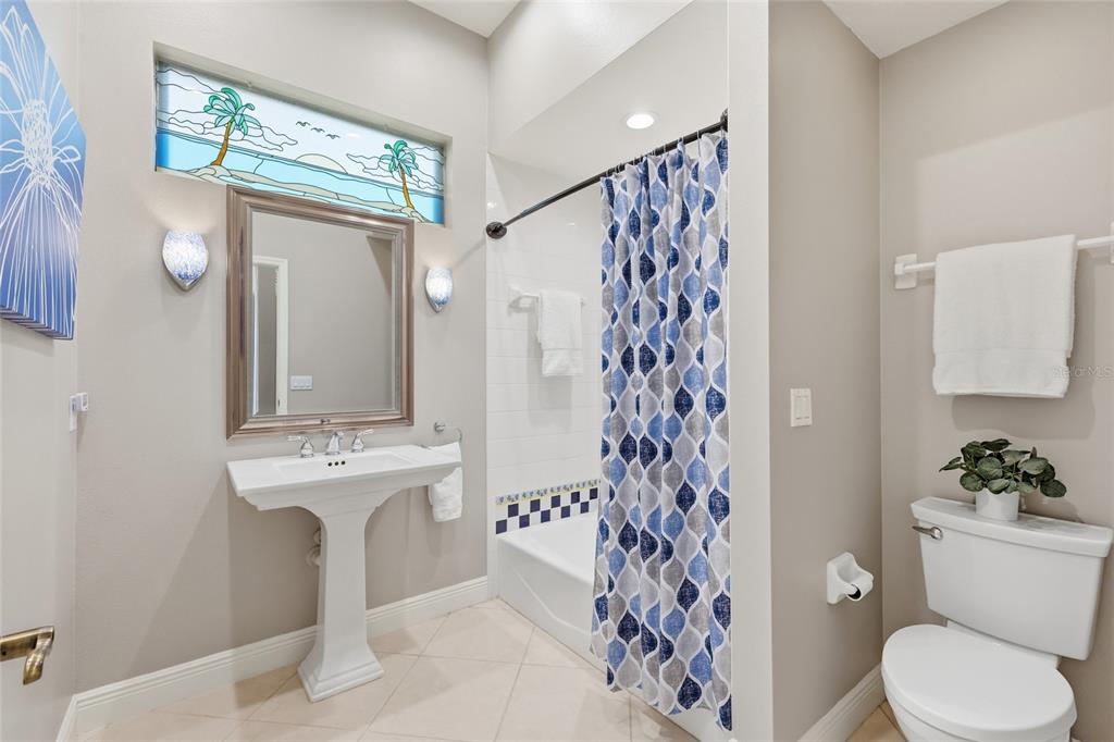 7060 Whitemarsh Circle Lakewood Ranch, FL 34202 - Photo 25 of 56 a bathroom with a sink toilet and shower