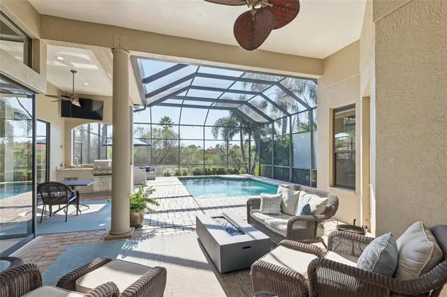 a view of a swimming pool with a patio