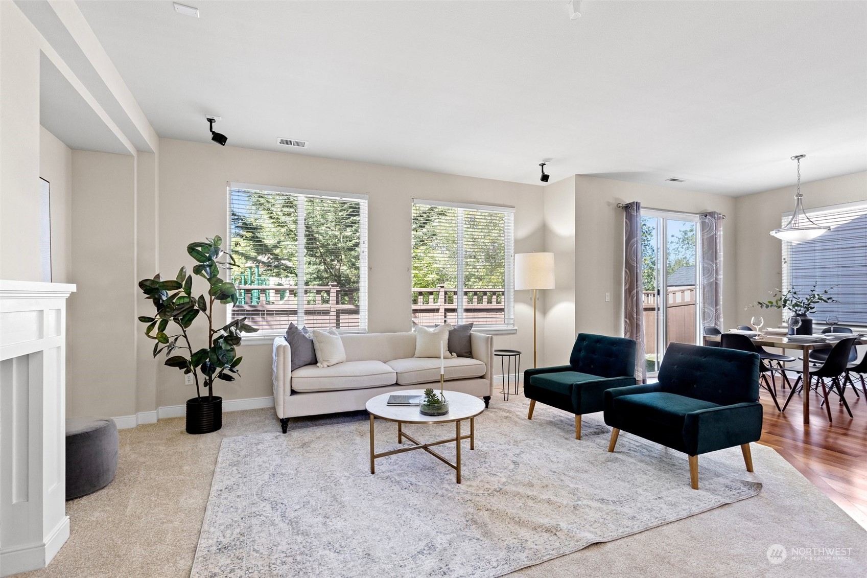 3609 182nd Street Southeast Bothell, WA 98012 - Photo 3 of 29 a living room with furniture potted plant and a large window