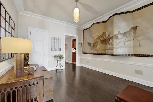 a view of a living room and a wooden floor
