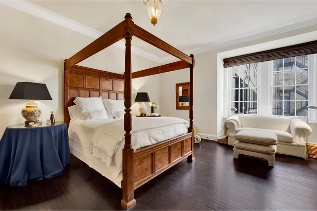 a bed room with a bed and a couch