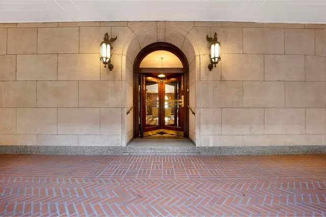 a view of a wooden door of a house