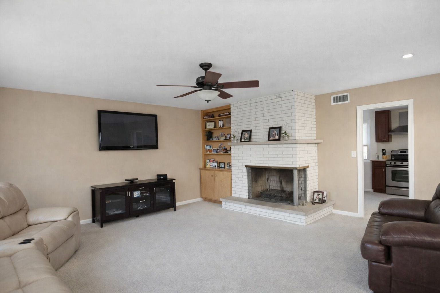 2204 Edgewood Road Waukegan, IL 60087 - Photo 3 of 4 a living room with furniture and a fireplace