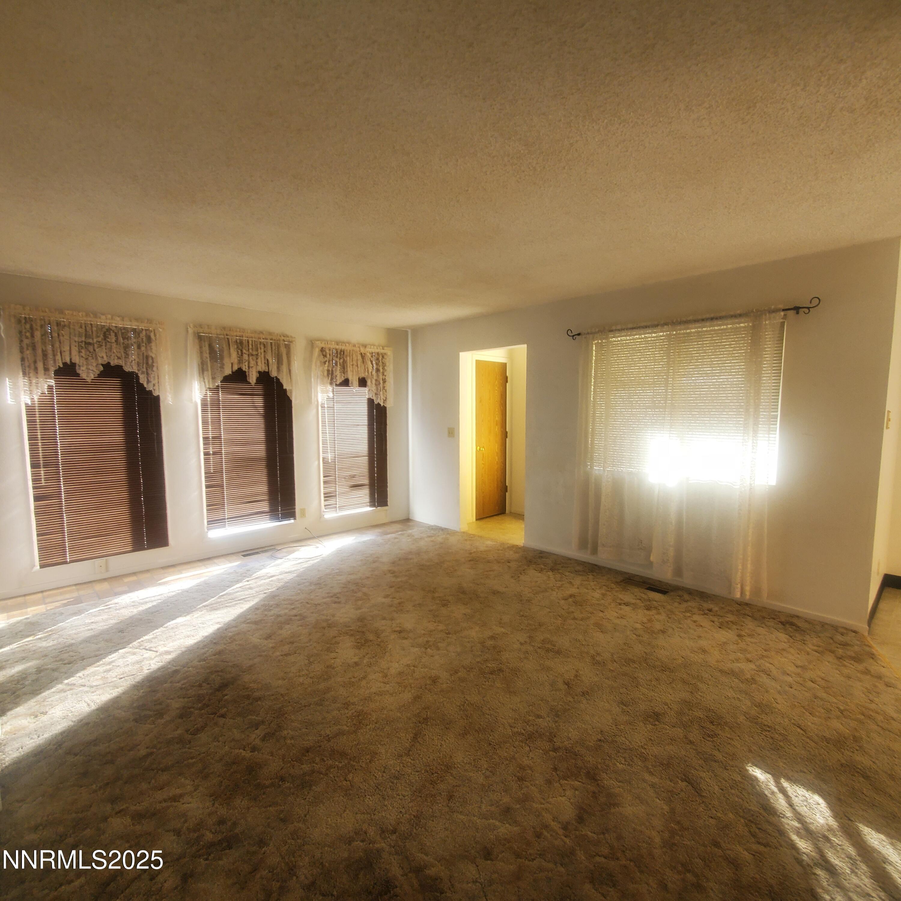 104 F Street Hawthorne, NV 89415 - Photo 7 of 17 104 F st livingroom from kitchen
