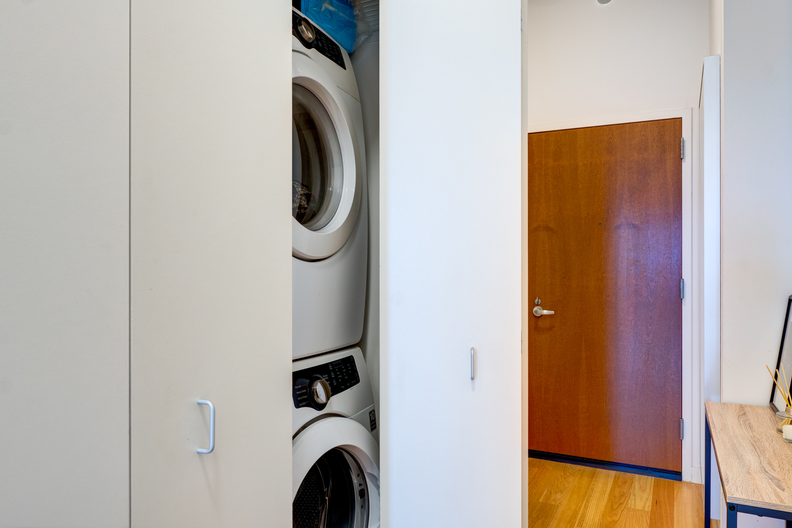 235 West Van Buren Street, Unit 3011 Chicago, IL 60607 - Photo 26 of 30 a utility room with dryer and washer