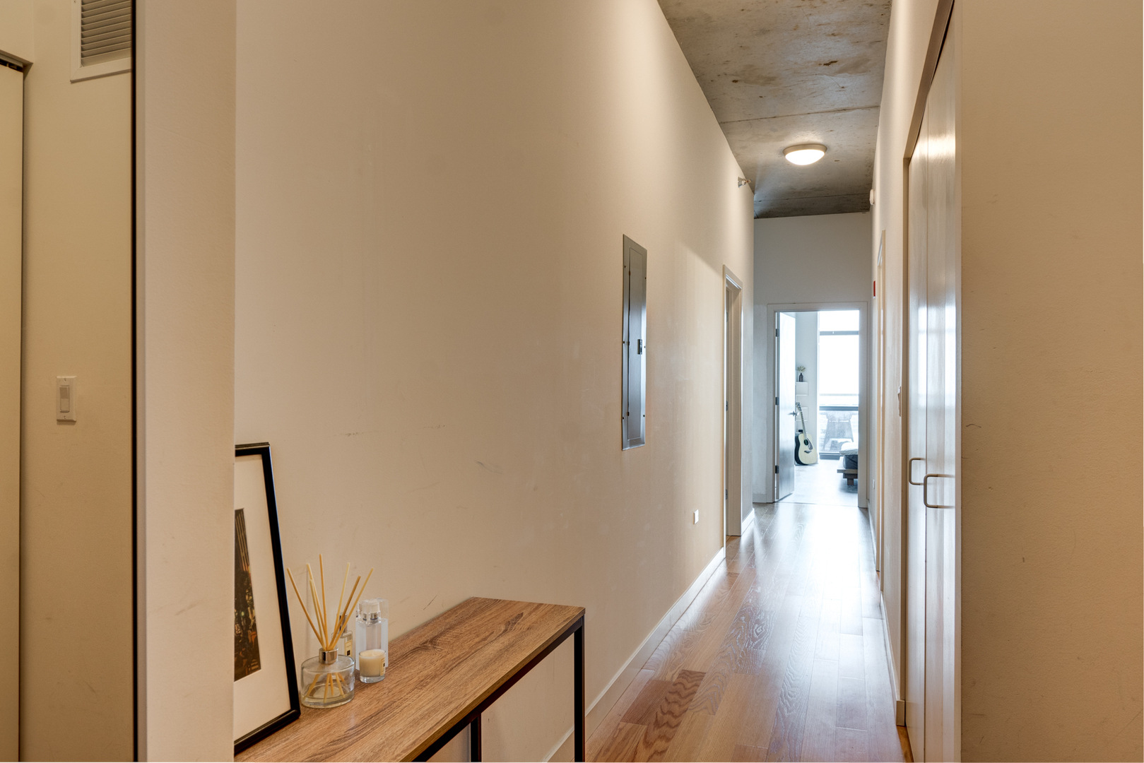 235 West Van Buren Street, Unit 3011 Chicago, IL 60607 - Photo 28 of 30 a view of a hallway with a room