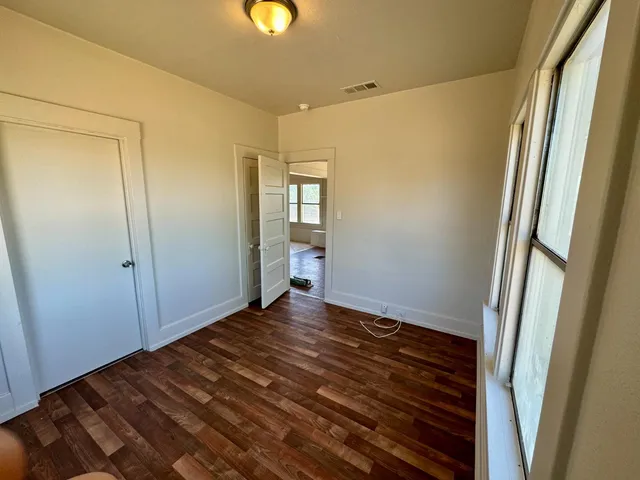a bathroom with a shower and a bath tub