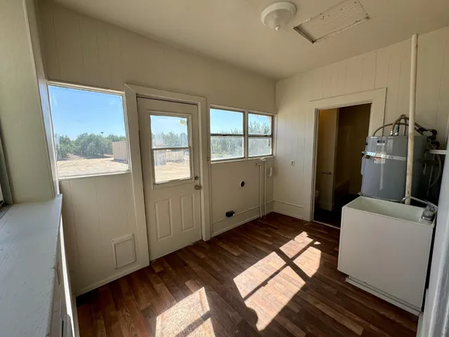 a bathroom with a sink and vanity