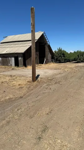 a view of a room with workspace and a window