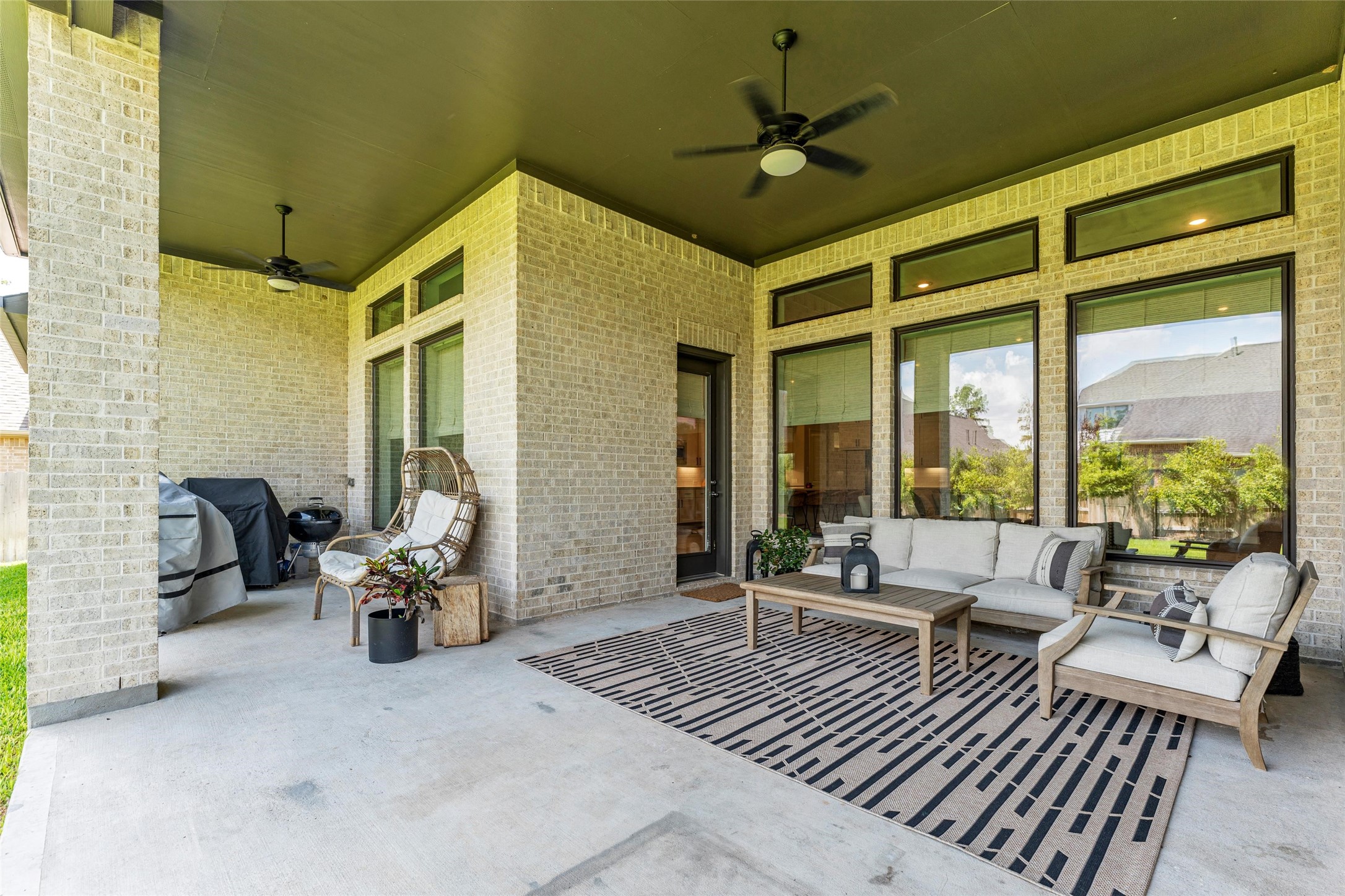 1027 Groveton Ridge Lane Pinehurst, TX 77362 - Photo 46 of 50 Another angle of the rear patio