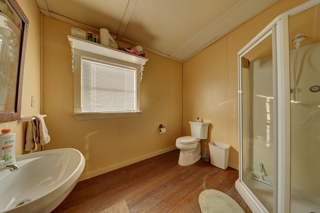 134 White Pearl Road Hunt, TX 78024 - Photo 15 of 40 a bathroom with a sink and a toilet
