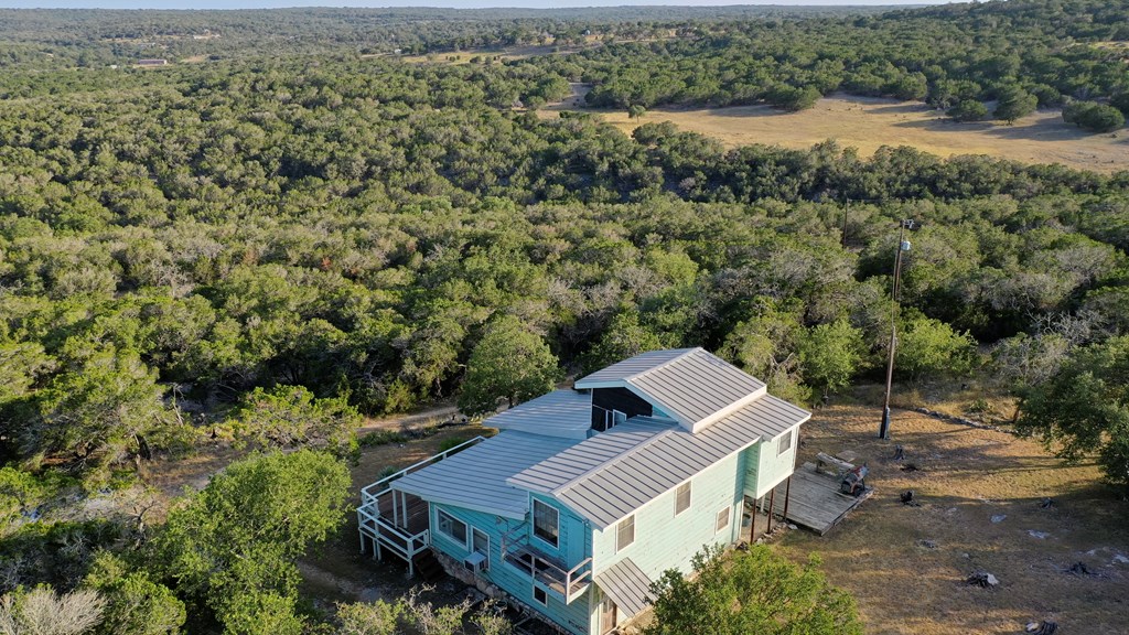 134 White Pearl Road Hunt, TX 78024 - Photo 31 of 40 an aerial view of a house with a yard