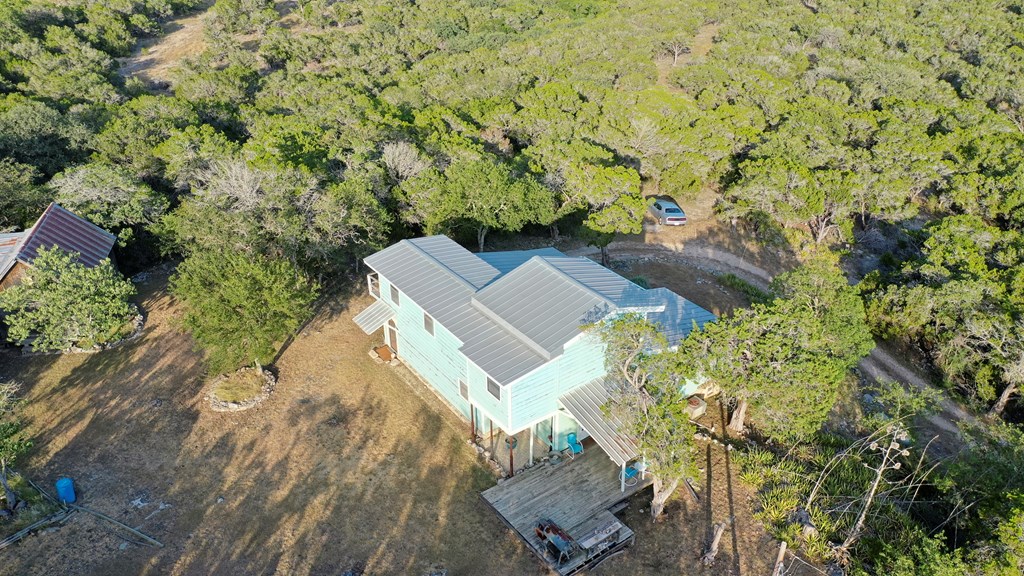 134 White Pearl Road Hunt, TX 78024 - Photo 32 of 40 an aerial view of a house with yard