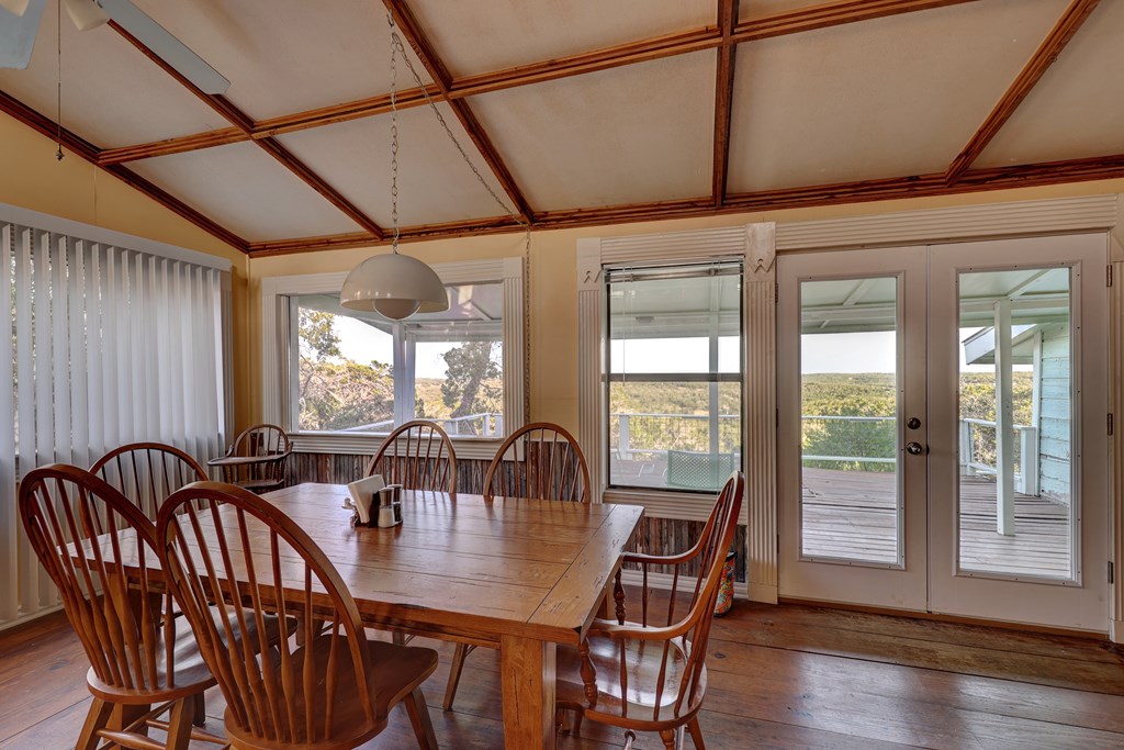 134 White Pearl Road Hunt, TX 78024 - Photo 6 of 40 a view of a dining room with furniture window and wooden floor