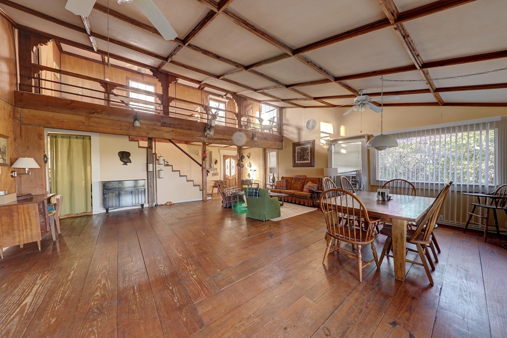134 White Pearl Road Hunt, TX 78024 - Photo 7 of 40 a view of a dining room with furniture window and wooden floor