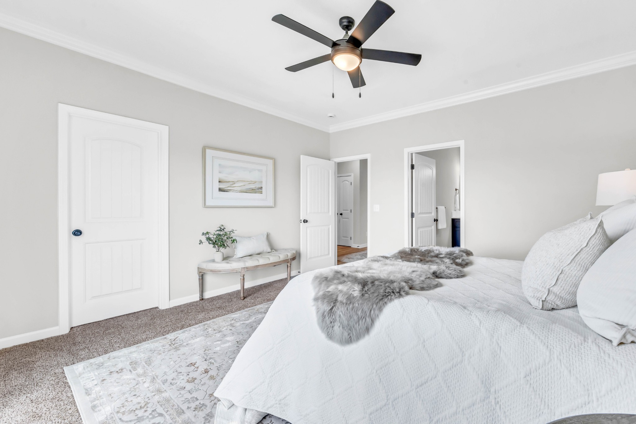 2399 Pea Ridge Road Clarksville, TN 37040 - Photo 16 of 26 a bedroom with a large bed and a chandelier