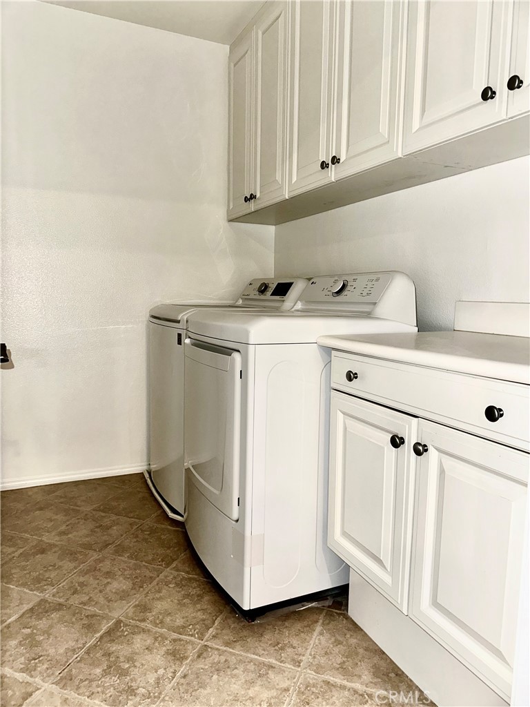 21 Durlston Way Ladera Ranch, CA 92694 - Photo 37 of 47 a view of cabinets with wooden floor
