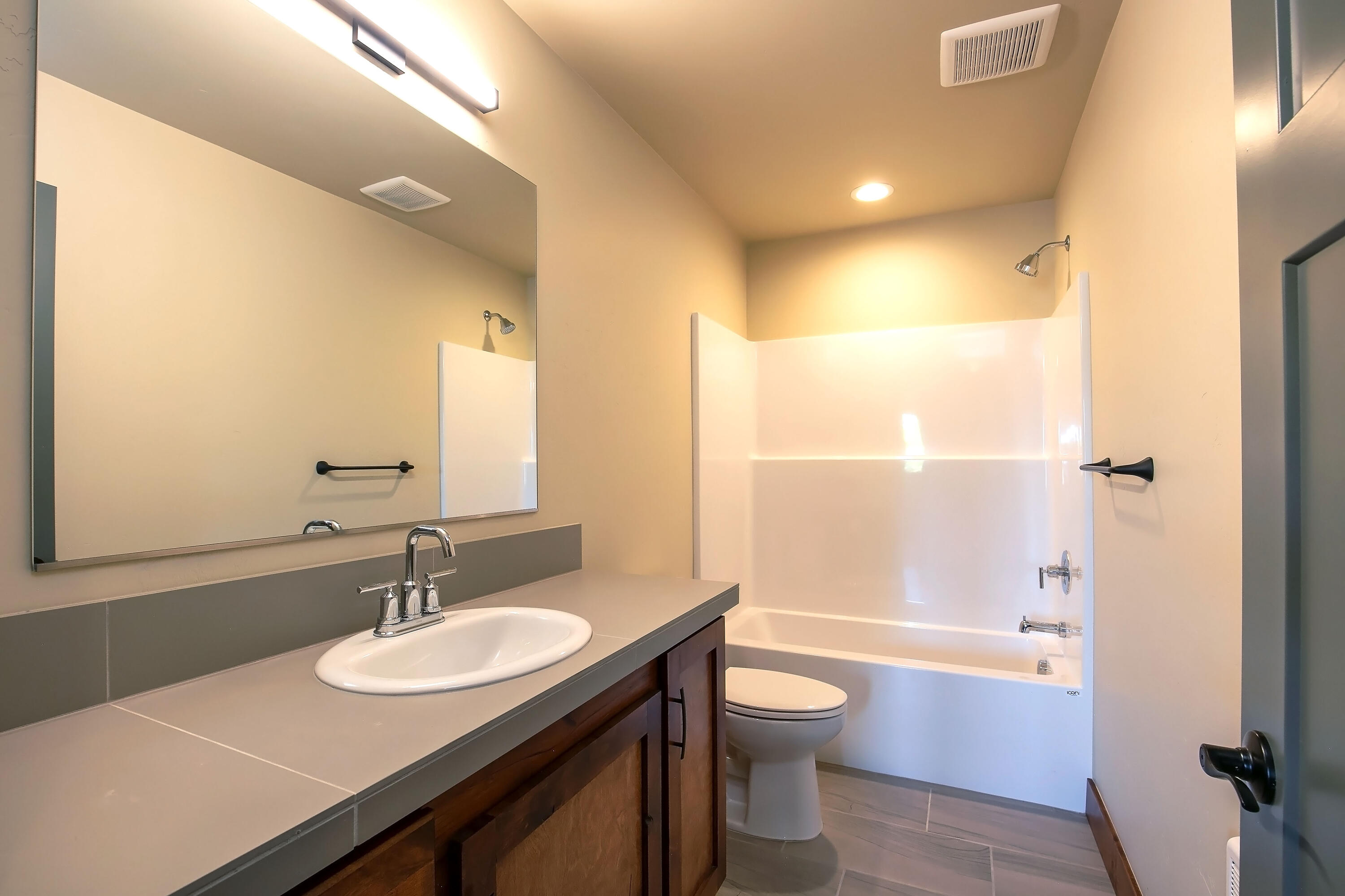 1472 Northeast Hudspeth Road Prineville, OR 97754 - Photo 19 of 26 a bathroom with a sink toilet tub and shower
