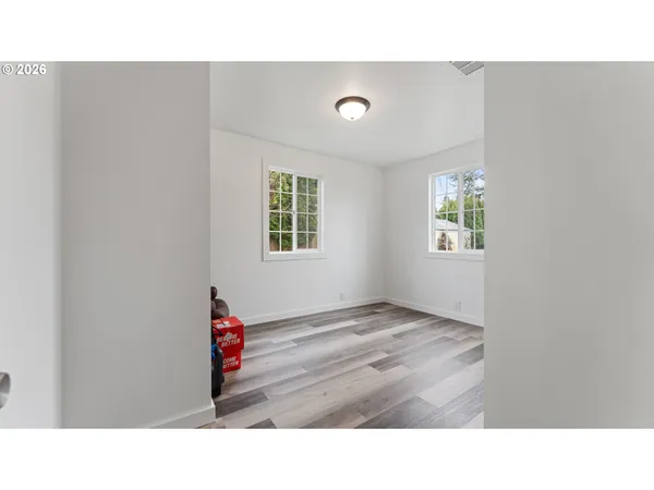 a bathroom with a sink and a window
