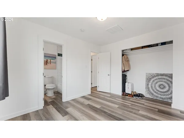 a bathroom with a sink a mirror and a shower
