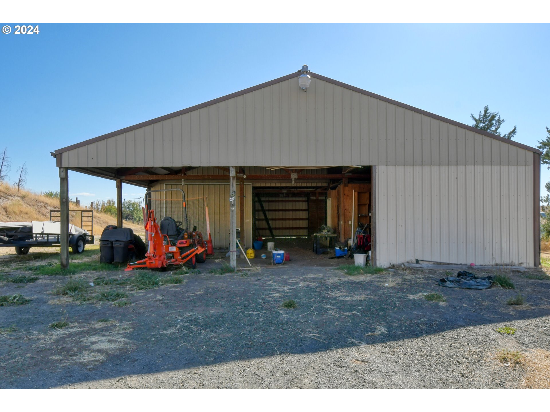 Jerico Lane Pendleton, OR 97801 - Photo 21 of 39 a view of a house with two chairs and a yard