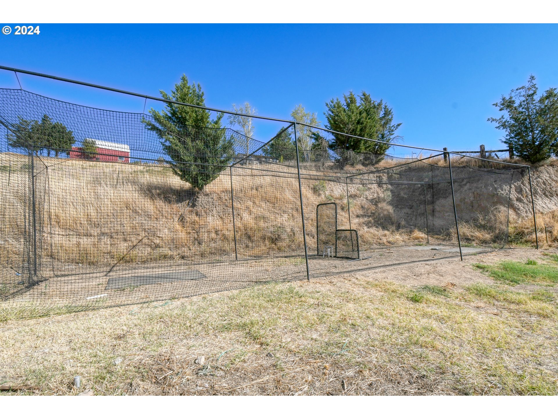 Jerico Lane Pendleton, OR 97801 - Photo 23 of 39 a view of a yard with a flower